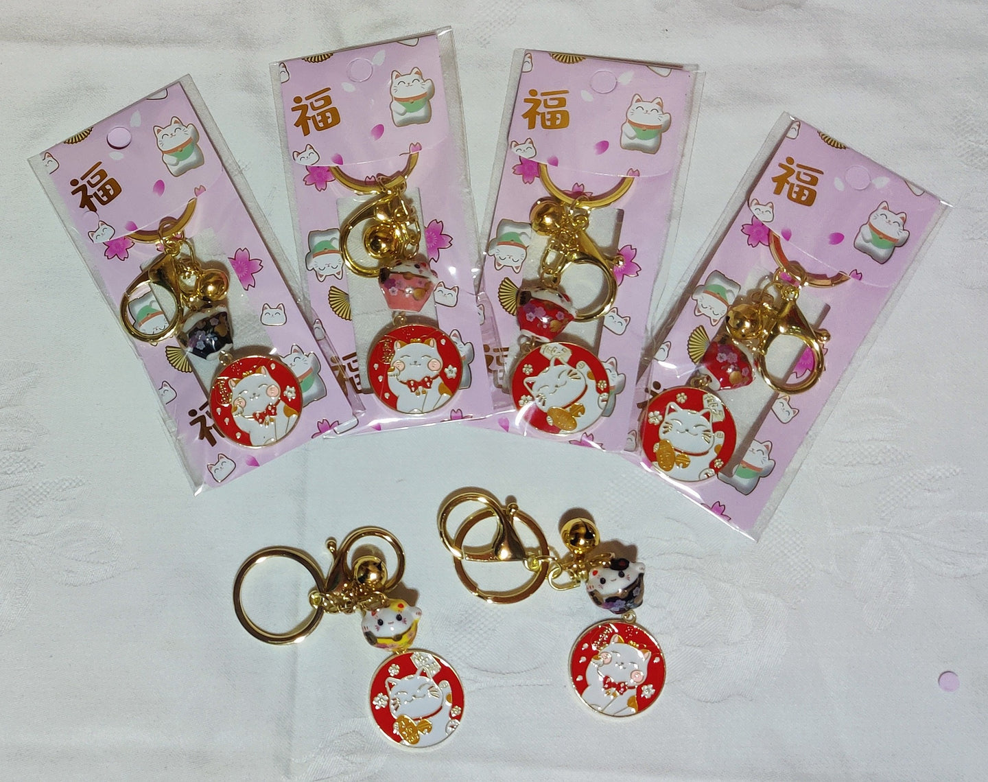 Porte-clés en porcelaine, métallique et clochette  (D:3,00cm)
