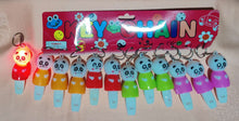 Porte-clés panda sifflet en plastique 2,50x2,50x7,00cm