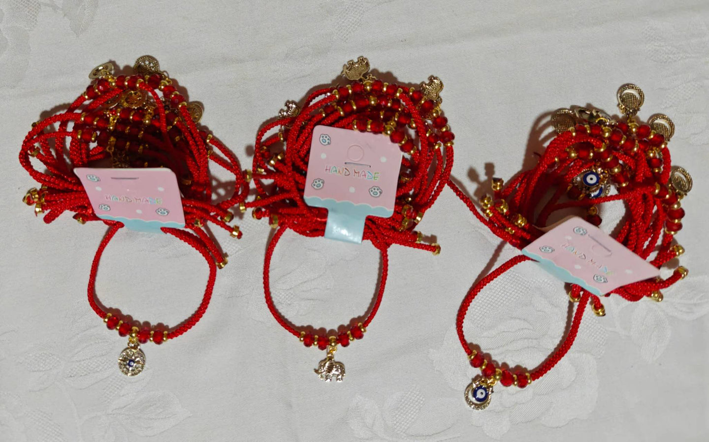 Bracelet fil rouge d'éléphant... (3 motifs)