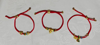 Bracelet fil rouge bambou, poisson, bonheur