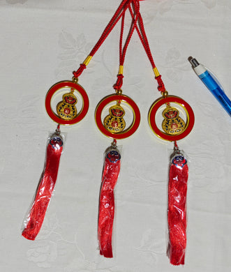 Accrochage forme de calebasse en alliage (5,50 x 30,00 cm)