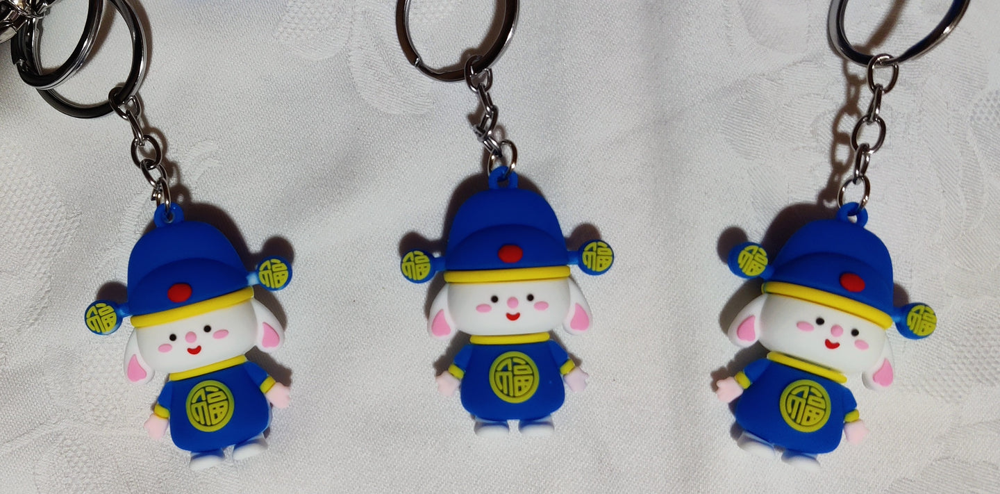 Porte-clés poupée chinoise bleu en caoutchouc (2.80 x 5.00 cm)