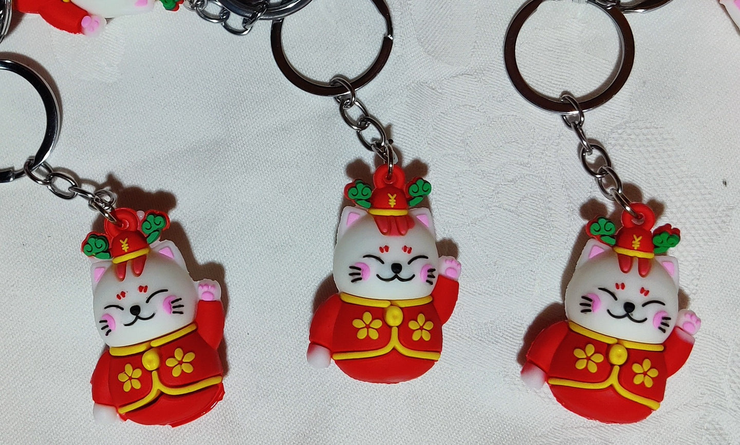 Porte-clés chat rouge traditionnel en caoutchouc (3.20 x 4.50 cm)
